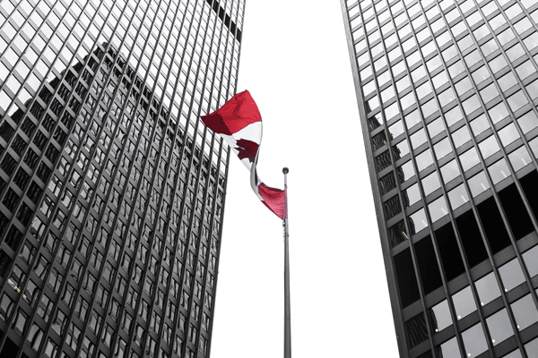 Canadian-Flag-Between-2-Buildings
