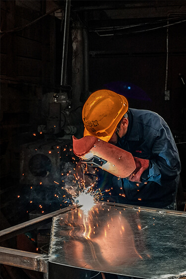 Man Welding